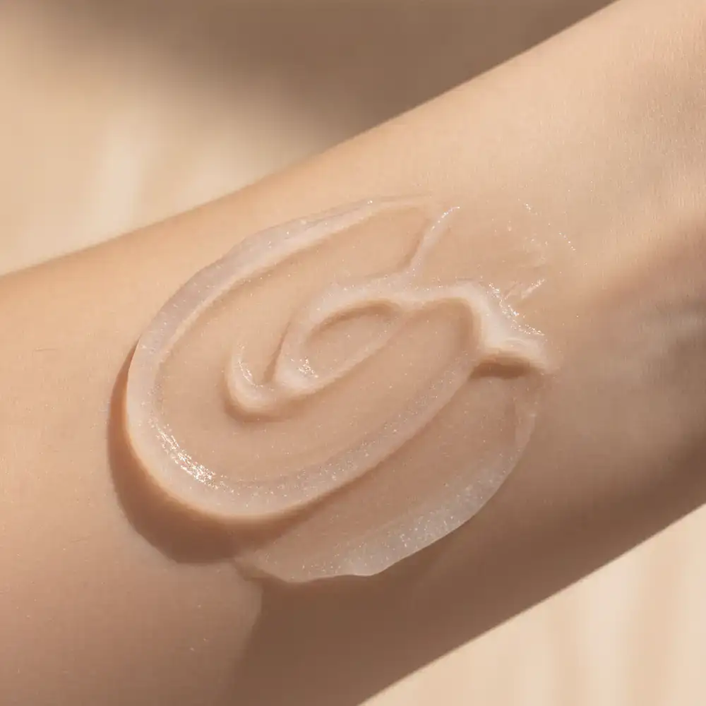 Gentle cleanser texture applied on skin